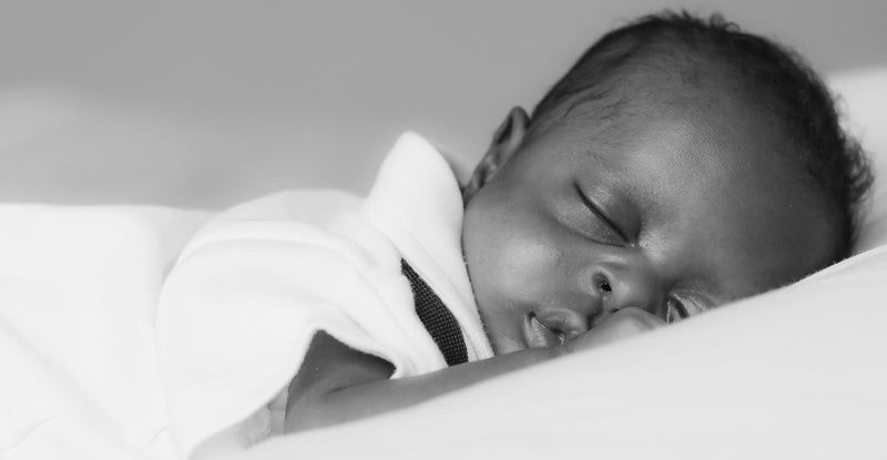 What's Actually Touching Your Baby's Skin? The Truth About Conventional Baby Clothing